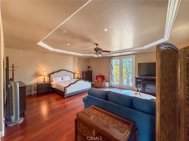 43097 Calle Camellia, Temecula, CA 92592 - bedroom featuring a tray ceiling, a textured ceiling, wood finished floors, access to exterior, and ornamental molding