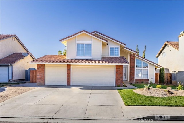 2143 Westminster Dr, Palmdale, CA 93550 - traditional-style house featuring a tile roof, brick siding, concrete driveway, and an attached garage