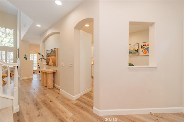5 Bretagne, Newport Coast, CA 92657 - hall featuring wood finished floors, arched walkways, and recessed lighting