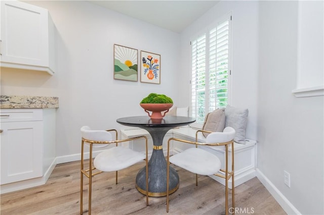 5 Bretagne, Newport Coast, CA 92657 - dining space featuring light wood-style flooring and baseboards
