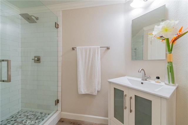 5 Bretagne, Newport Coast, CA 92657 - full bathroom with a stall shower, vanity, and ornamental molding