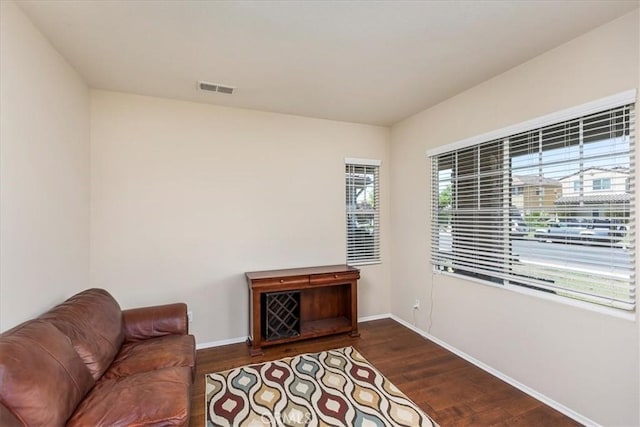 31578 Waterfall Way, Murrieta, CA 92563 - sitting room featuring baseboards and dark wood-type flooring
