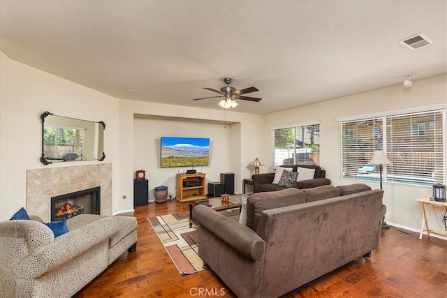 31578 Waterfall Way, Murrieta, CA 92563 - living room featuring wood-type flooring, ceiling fan, and a fireplace