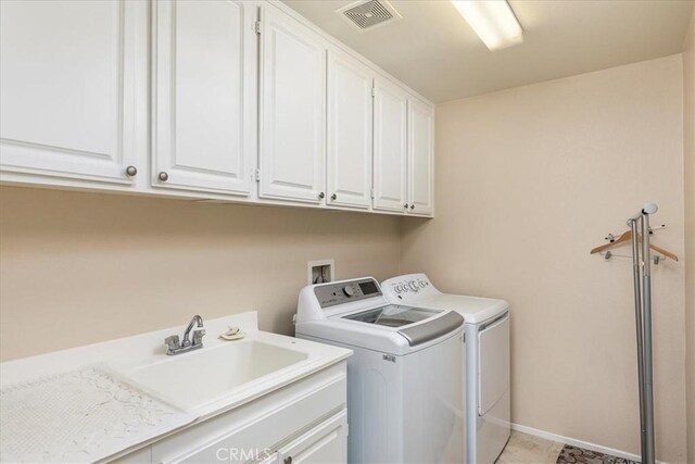 31578 Waterfall Way, Murrieta, CA 92563 - laundry room with cabinet space and washer and dryer