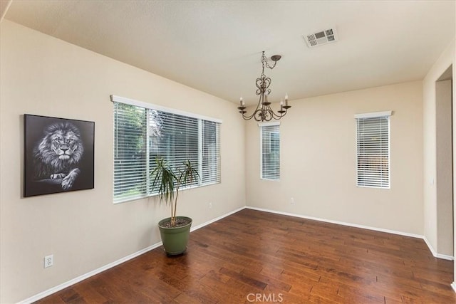 31578 Waterfall Way, Murrieta, CA 92563 - spare room featuring wood-type flooring and a chandelier