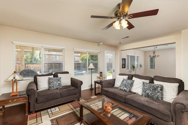 31578 Waterfall Way, Murrieta, CA 92563 - living area featuring a ceiling fan and a chandelier