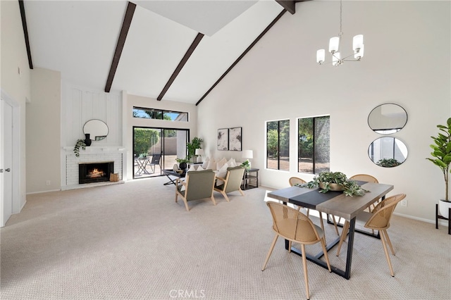 1061 Regis Way, Tustin, CA 92780 - dining space featuring high vaulted ceiling, light colored carpet, a chandelier, beam ceiling, and a fireplace