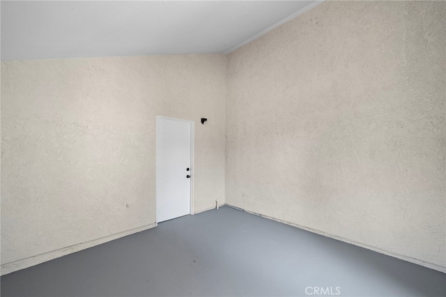 1061 Regis Way, Tustin, CA 92780 - spare room featuring finished concrete flooring and a textured wall