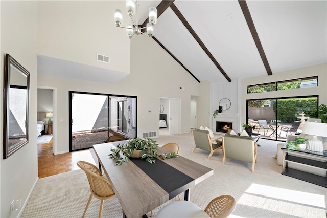 1061 Regis Way, Tustin, CA 92780 - dining area with high vaulted ceiling, a fireplace, light carpet, a chandelier, and beam ceiling