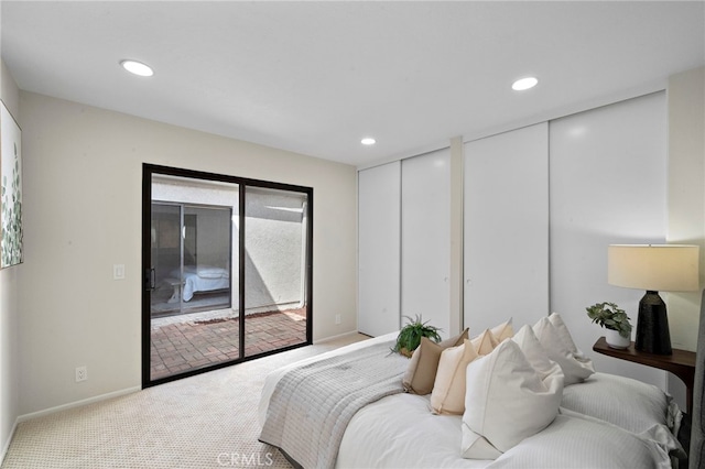 1061 Regis Way, Tustin, CA 92780 - bedroom featuring access to outside, carpet floors, recessed lighting, and two closets