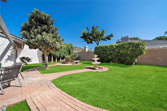 1061 Regis Way, Tustin, CA 92780 - view of yard with a patio