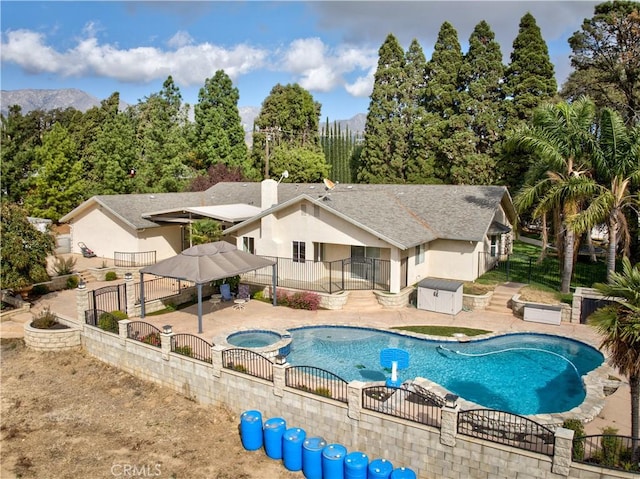 43350 Dunlap, Banning, CA 92220 - view of pool featuring a fenced backyard, a patio, and a pool with connected hot tub