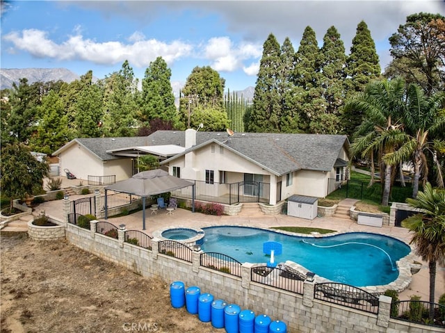 43350 Dunlap, Banning, CA 92220 - view of swimming pool with a fenced backyard, a patio area, a gazebo, and a pool with connected hot tub