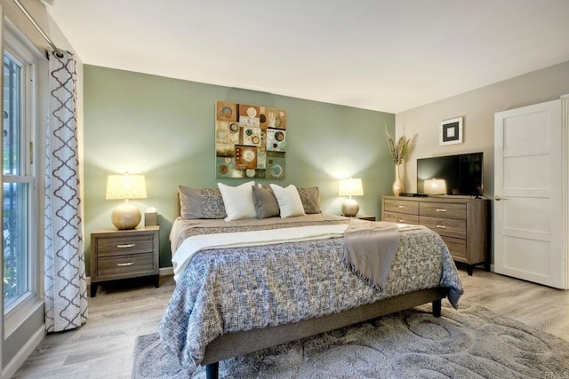 12395 Filera Rd, San Diego, CA 92128 - bedroom featuring light wood-type flooring