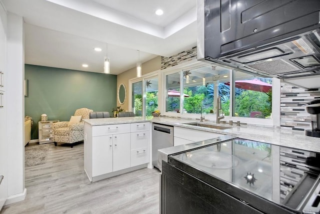 12395 Filera Rd, San Diego, CA 92128 - kitchen featuring white cabinets, light wood finished floors, light stone counters, a peninsula, and recessed lighting
