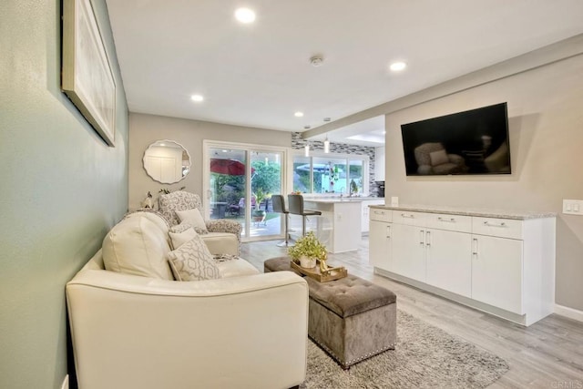12395 Filera Rd, San Diego, CA 92128 - living area featuring recessed lighting and light wood-style floors