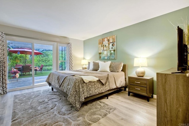 12395 Filera Rd, San Diego, CA 92128 - bedroom featuring access to outside and wood finished floors