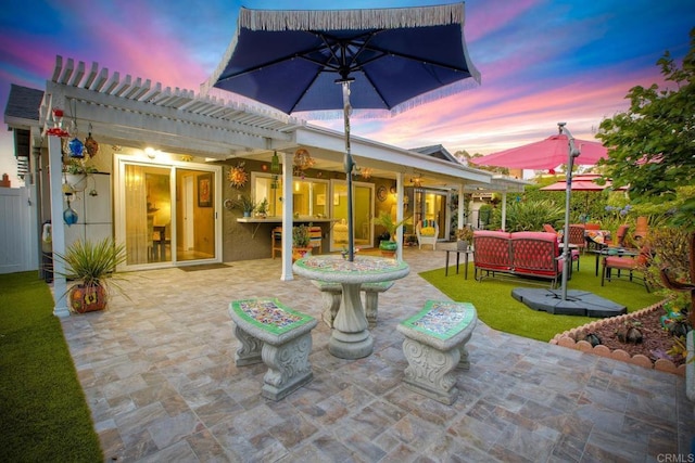 12395 Filera Rd, San Diego, CA 92128 - patio terrace at dusk with a patio area and outdoor lounge area