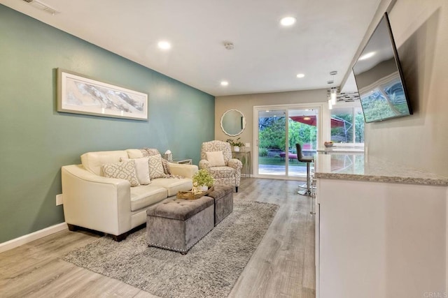 12395 Filera Rd, San Diego, CA 92128 - living area featuring light wood-style floors and recessed lighting