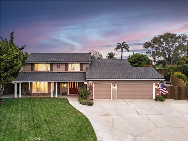 4368 Manchester Ct, Santa Maria, CA 93455 - traditional-style house with driveway, an attached garage, brick siding, and covered porch