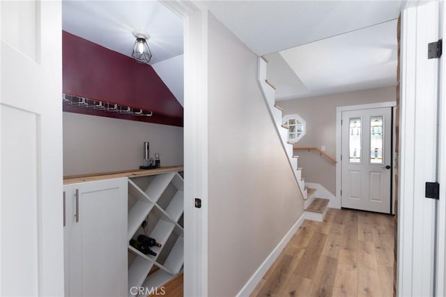 4368 Manchester Ct, Santa Maria, CA 93455 - bar featuring stairs, wood finished floors, and lofted ceiling