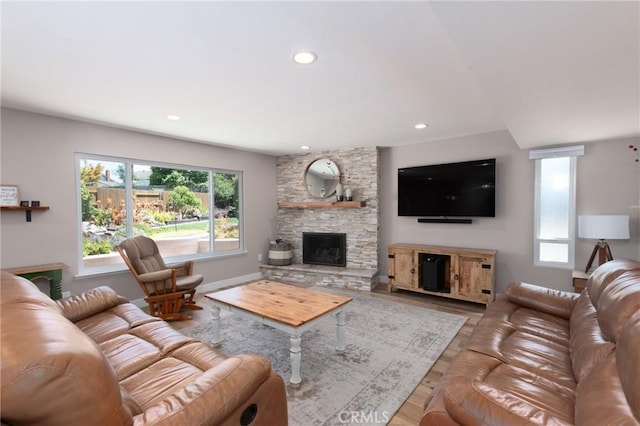 4368 Manchester Ct, Santa Maria, CA 93455 - living room featuring a stone fireplace, wood finished floors, and recessed lighting