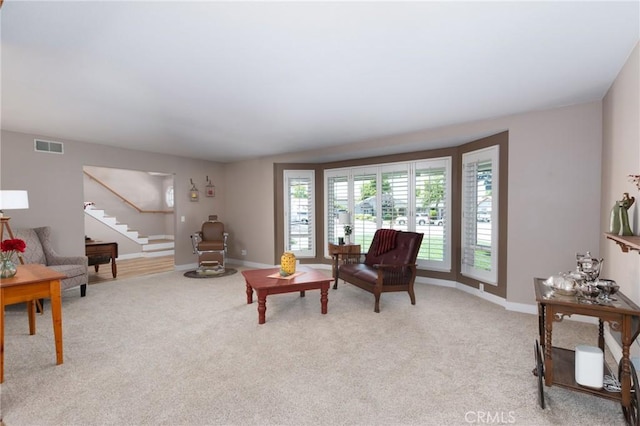 4368 Manchester Ct, Santa Maria, CA 93455 - living room featuring stairs and light colored carpet