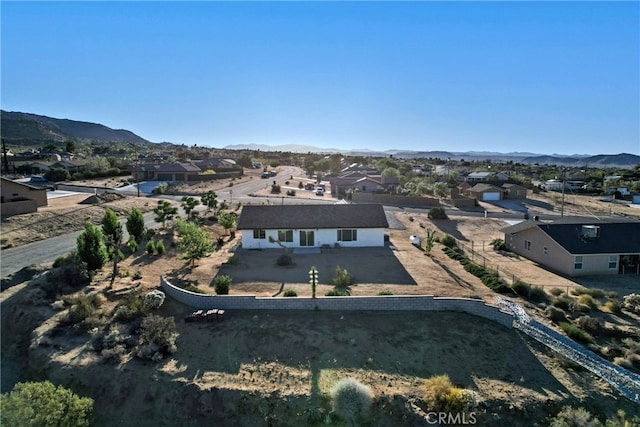 7765 Elwood St, Joshua Tree, CA 92252 - aerial view of residential area featuring a mountain backdrop