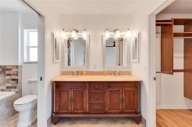 7765 Elwood St, Joshua Tree, CA 92252 - bathroom featuring a bath and double vanity