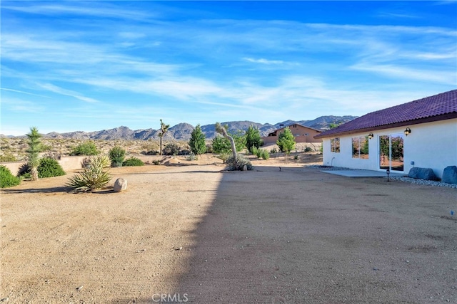 7765 Elwood St, Joshua Tree, CA 92252 - view of yard with a mountain view