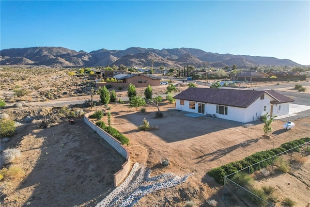 7765 Elwood St, Joshua Tree, CA 92252 - aerial view of property and surrounding area with a mountainous background