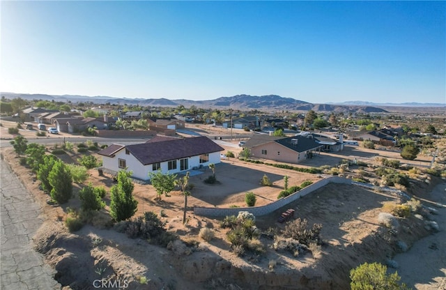 7765 Elwood St, Joshua Tree, CA 92252 - aerial view of residential area featuring a mountainous background