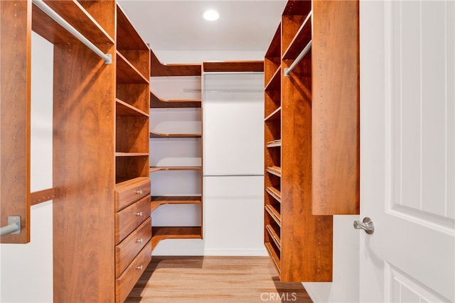 7765 Elwood St, Joshua Tree, CA 92252 - spacious closet with wood finished floors