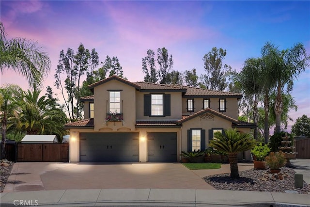 22760 Shadygrove Ct, Wildomar, CA 92595 - mediterranean / spanish-style home with a garage, a tiled roof, stucco siding, driveway, and a gate