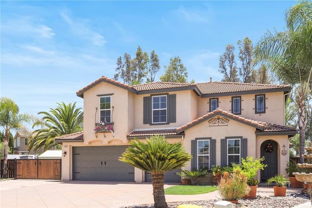 22760 Shadygrove Ct, Wildomar, CA 92595 - mediterranean / spanish-style home featuring a tiled roof, an attached garage, and driveway