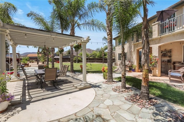 22760 Shadygrove Ct, Wildomar, CA 92595 - patio / terrace featuring a patio, outdoor dining area, a yard, and a mountain view