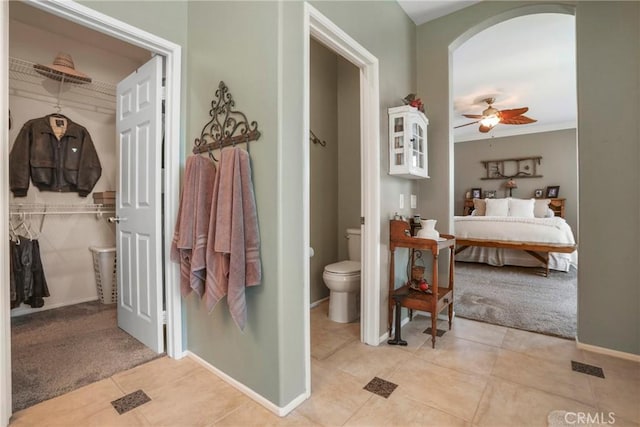 22760 Shadygrove Ct, Wildomar, CA 92595 - ensuite bathroom with tile patterned floors, a ceiling fan, and a spacious closet