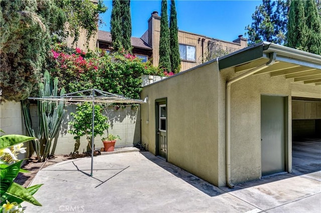 1032 S Golden W Ave Unit A, Arcadia, CA 91007 - view of home's exterior featuring a patio and stucco siding