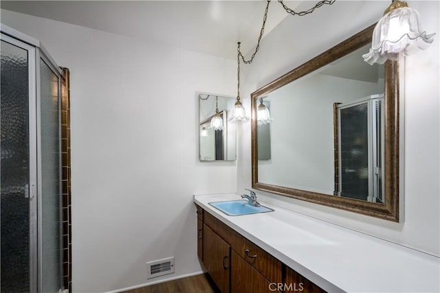 1032 S Golden W Ave Unit A, Arcadia, CA 91007 - bathroom featuring vanity, a shower stall, and wood finished floors
