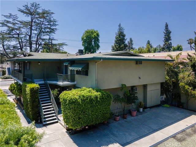1032 S Golden W Ave Unit A, Arcadia, CA 91007 - view of front of property with stairway and stucco siding