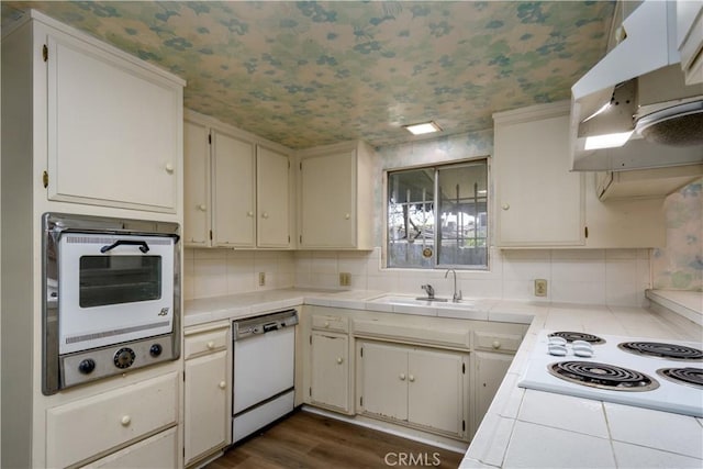 1032 S Golden W Ave Unit A, Arcadia, CA 91007 - kitchen with white appliances, tile counters, under cabinet range hood, and backsplash