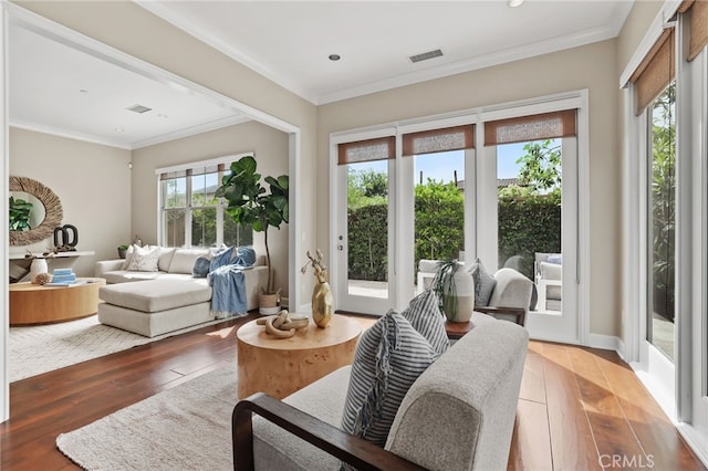54 Sycamore Bnd, Irvine, CA 92620 - living area featuring hardwood / wood-style floors, recessed lighting, and crown molding