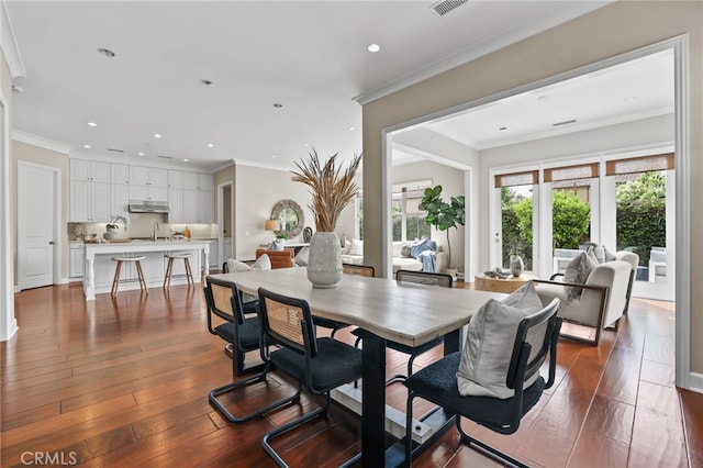 54 Sycamore Bnd, Irvine, CA 92620 - dining area with wood-type flooring, ornamental molding, and recessed lighting