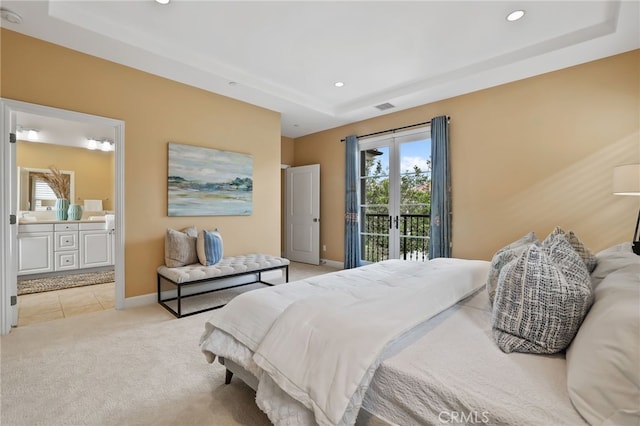 54 Sycamore Bnd, Irvine, CA 92620 - bedroom featuring a tray ceiling, access to exterior, recessed lighting, light colored carpet, and ensuite bath