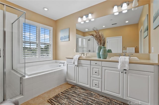 54 Sycamore Bnd, Irvine, CA 92620 - full bathroom featuring double vanity, healthy amount of natural light, a shower stall, a garden tub, and recessed lighting
