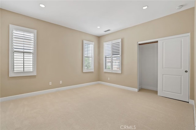 54 Sycamore Bnd, Irvine, CA 92620 - unfurnished bedroom with light carpet, recessed lighting, and a closet