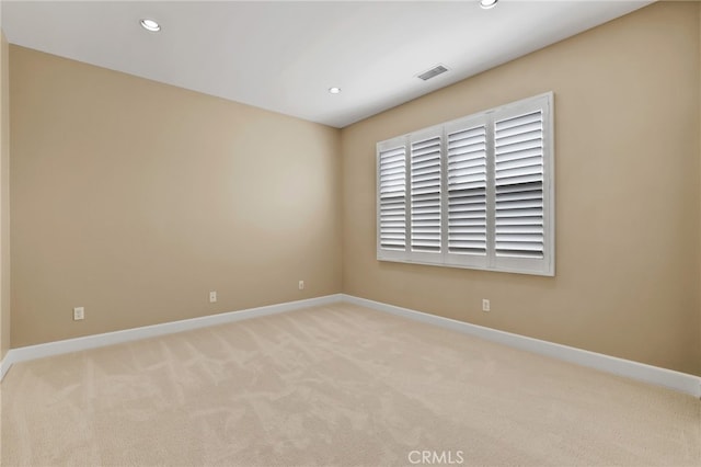 54 Sycamore Bnd, Irvine, CA 92620 - spare room with light colored carpet and recessed lighting