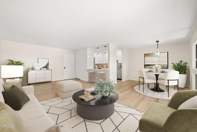 5300 E Atherton St Unit 2F, Long Beach, CA 90815 - living room featuring light wood-style floors