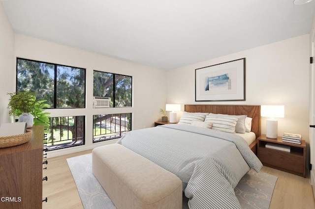 5300 E Atherton St Unit 2F, Long Beach, CA 90815 - bedroom with wood finished floors and cooling unit