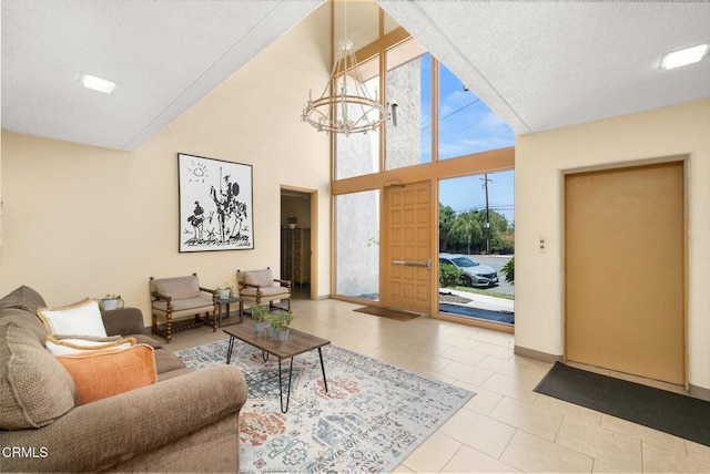 5300 E Atherton St Unit 2F, Long Beach, CA 90815 - tiled living room with a chandelier and a towering ceiling